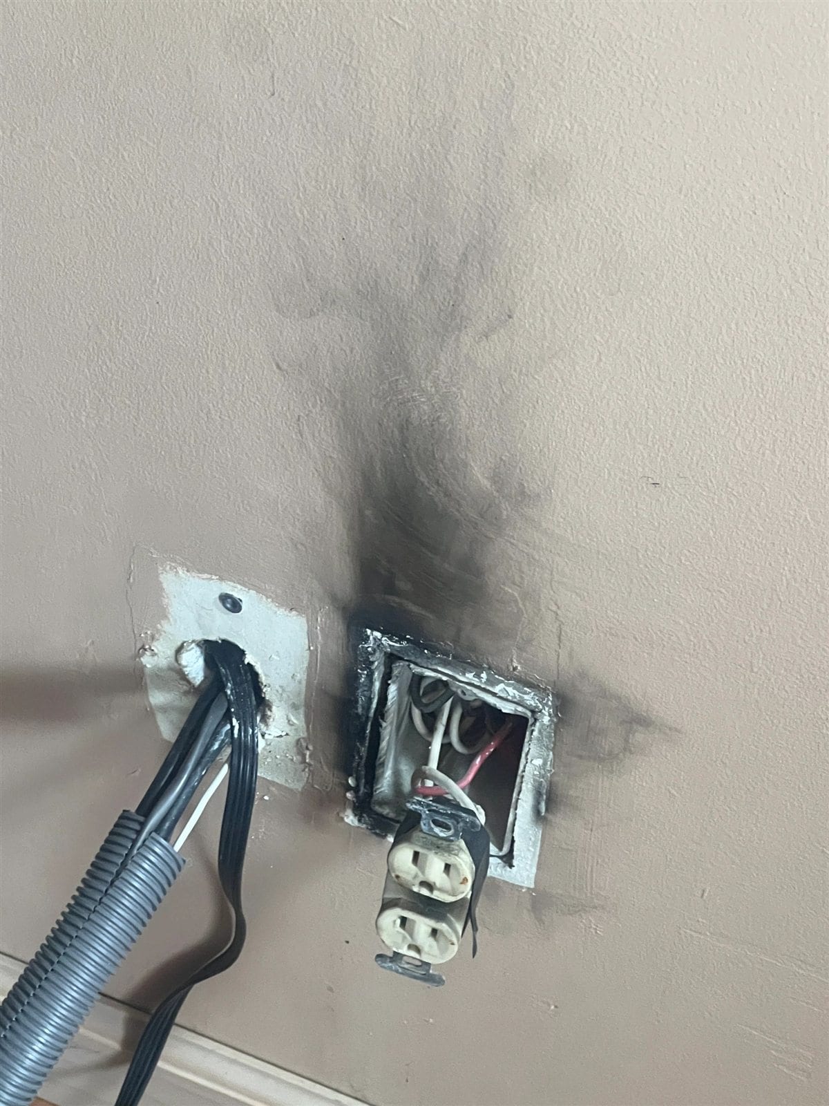 Heat damage around a garage receptacle and wiring used for electric vehicle charging