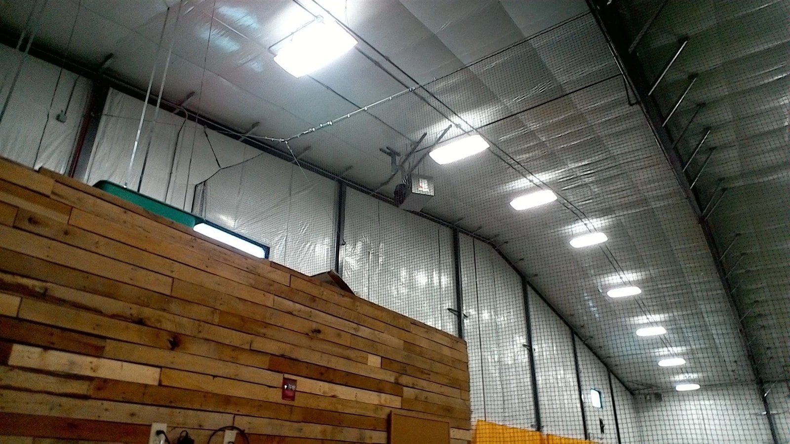 Commercial high-bay lighting installed in a large indoor facility